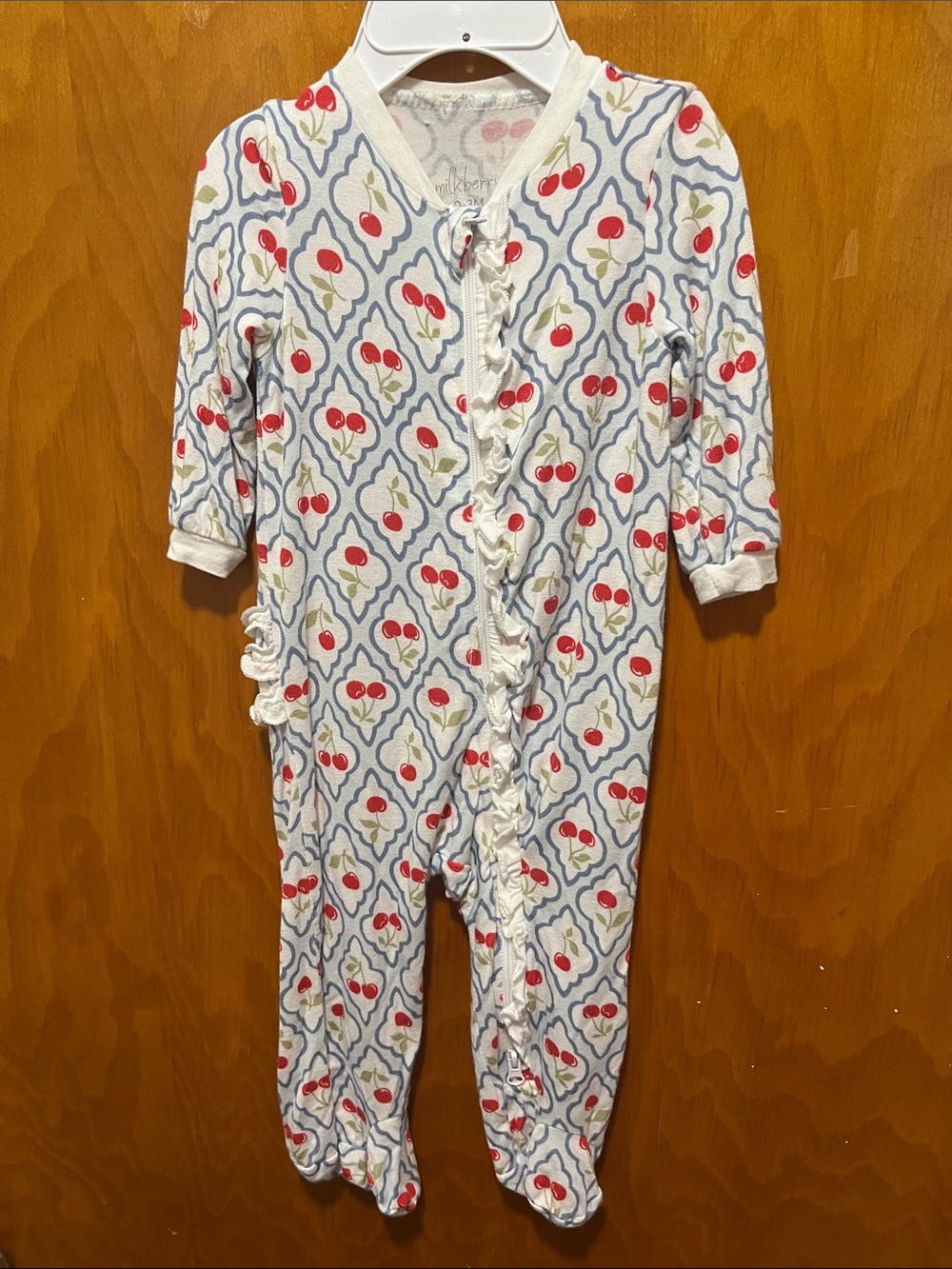 White Cherry-Print Ruffle Front Footed One-Piece for Kids